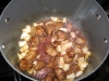 Add wine to de-glaze